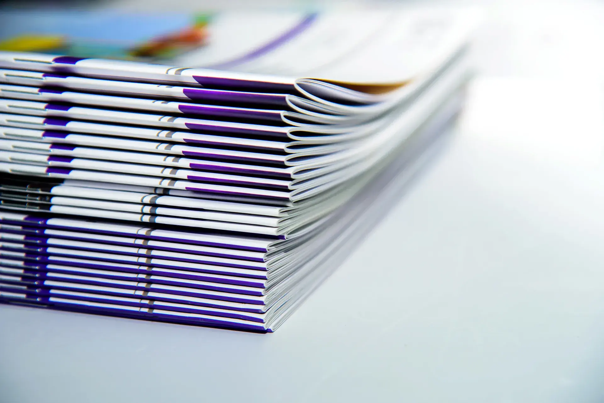 Custom printed booklets in a stack